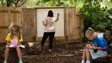 Students attend class in an outdoor classroom at Bentley Primary School