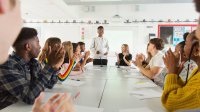 High school students participate in classroom debate