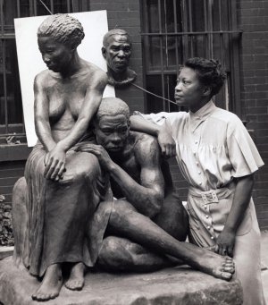 Augusta Savage with her sculpture Realization, c. 1938.