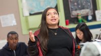 High school student giving a presentation to the class