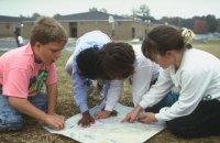 Elementary school students study may outside classroom 