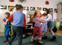 Elementary school children dancing in the classroom