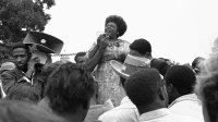 In this Sept. 17, 1965 file photo, Fannie Lou Hamer, of Ruleville, Miss., speaks to Mississippi Freedom Democratic Party sympathizers outside the Capitol in Washington