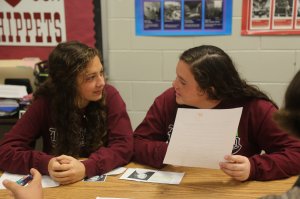 Two students work on a project on Selma in Jessica Dickens' class.