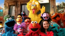 An image of the Sesame Street muppets on Sesame Street