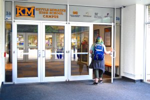 A student walks into Kettle Moraine High School.