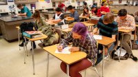 High school science class taking a test