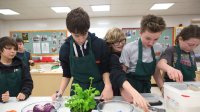 Middle school students in cooking class