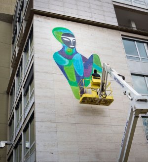 Brazilian graffiti artist Rimon Guimaraes works on a giant graffiti painting in Frankfurt Main, Germany, 18 April 2013