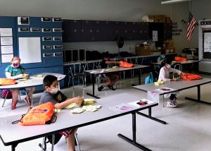 Students in Meriden work on classwork at summer school.