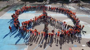 Elementary school students in Madison, Wisconsin, form a peace sign as part of a Unity Day celebration.