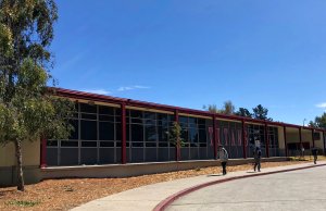 Students walk in front of Skyline High School.