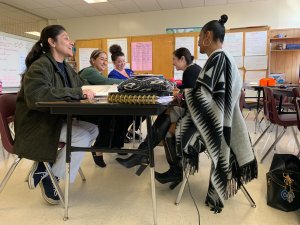 Teachers sitting around table