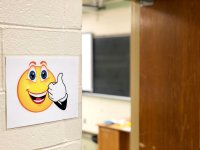 A sign with a smiley face and a thumbs up indicates an open classroom at North Valley Regional in New Jersey.