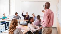 High school classroom with teacher and students