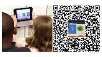 Two students looking at a QR code