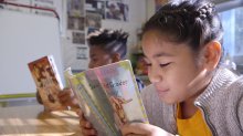 Students reading at Reach Academy in Oakland, California.