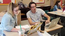 Two teachers work together during a planning session