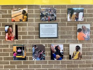 Student photography displayed on a classroom wall