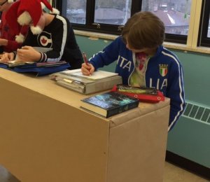 Students using stand up table