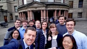 Class in front of building