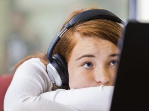 Unengaged student with headphones
