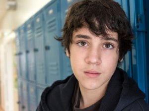 Young boy looking pensive