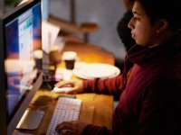 Boy working on computer