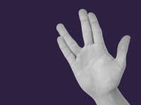 A hand with a dark purple background giving the Vulcan salute, which looks like a peace sign, but made with four fingers, instead of two, and with the thumb up. 