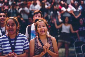 Students applaud during an assembly at Humanitas Social Justice Academy. 