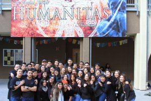 Senior mentors stand in front of Humanitas Social Justice Academy.
