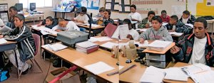 Boys working at their desks in class