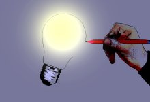 Illustration of a hand drawing a lighted light bulb