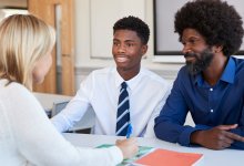 High school teacher meets with a student and his father