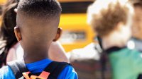 Rearview of Black elementary-aged boy