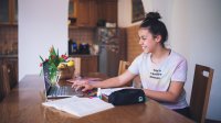 Teenage girl participates in virtual learning at home