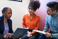 Parents meet with an educator