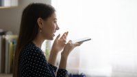 Woman talks on her smartphone