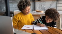 Elementary student interviews his mother at home