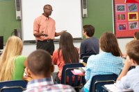 Teacher speaking in front of his class