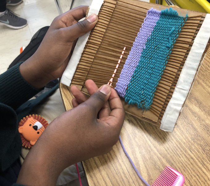 Photo of student doing weaving work