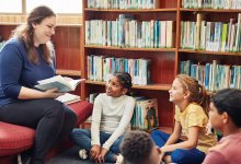 Elementary teacher reading to students