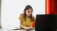 research topics for genius hour Middle grade aged girl at home distance learning on laptop
