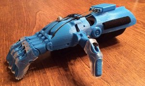 A blue, prosthetic hand that looks like a robot's hand.