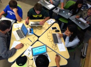 Students working at combined desks