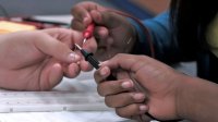 Hands at work on an electrical project