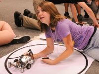 photo of a student working on a robotics project