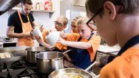 Photo of students cooking together