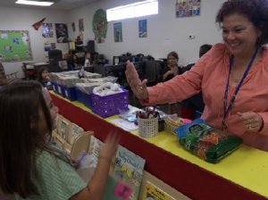 Teacher Giving Student a High Five