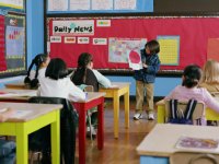 Student presenting in front of the class